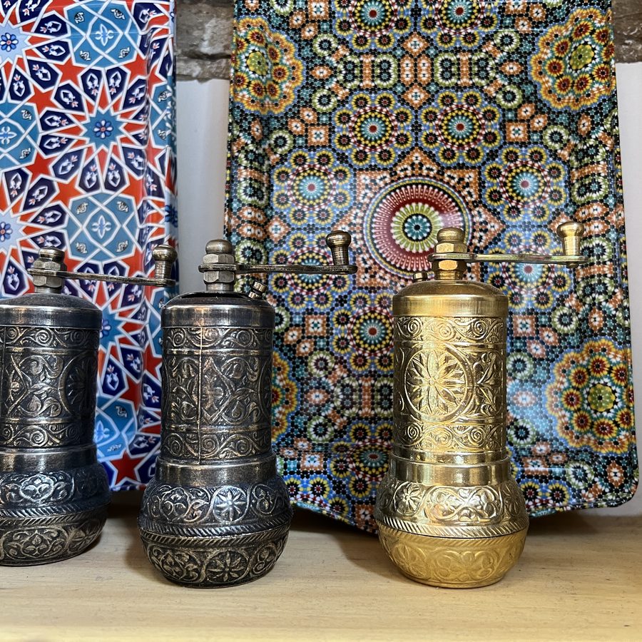 Tea tins on hand-painted Andalusian tile