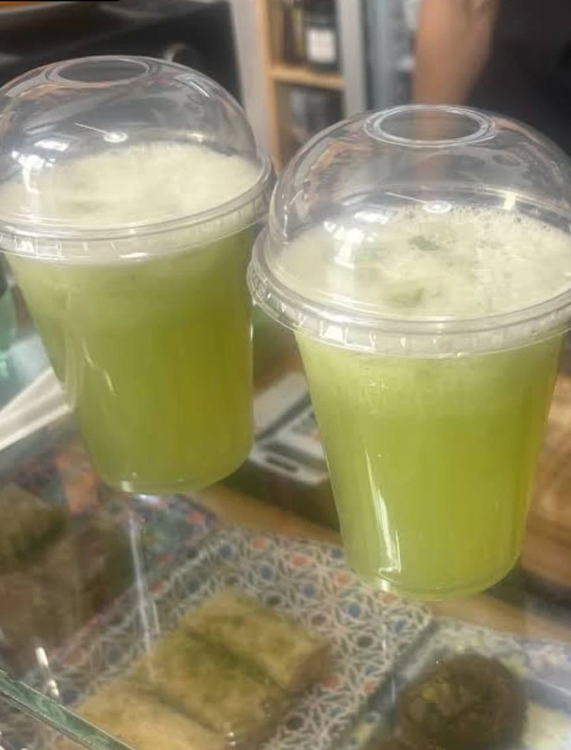 Two cups of fresh Arabic mint lemonade on the counter